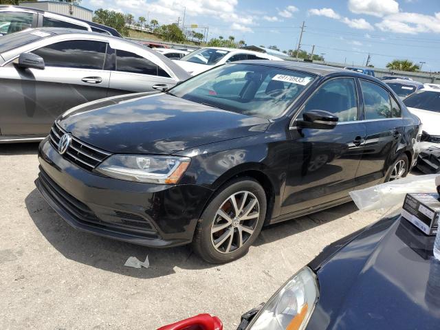 VOLKSWAGEN JETTA SE 2018 with VIN 3VWDB7AJ3JM236049 - Photo from auction