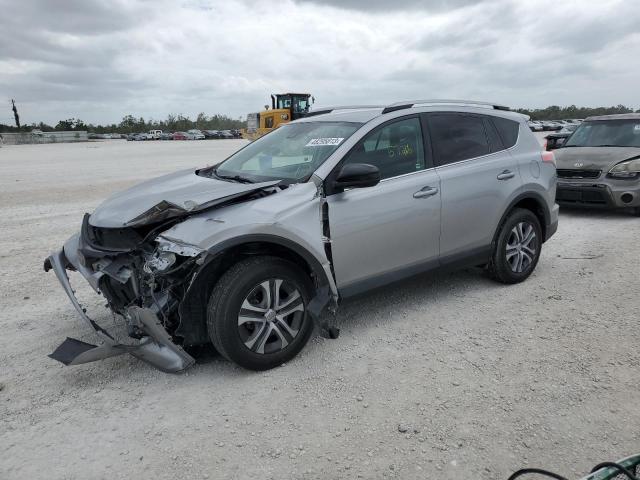 TOYOTA RAV4 LE 2018 with VIN 2T3ZFREV2JW461972 - Photo from auction