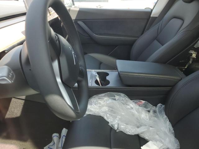 Photo 7 from auction – 2022 TESLA MODEL Y with VIN 7SAYGDEE8NF353334