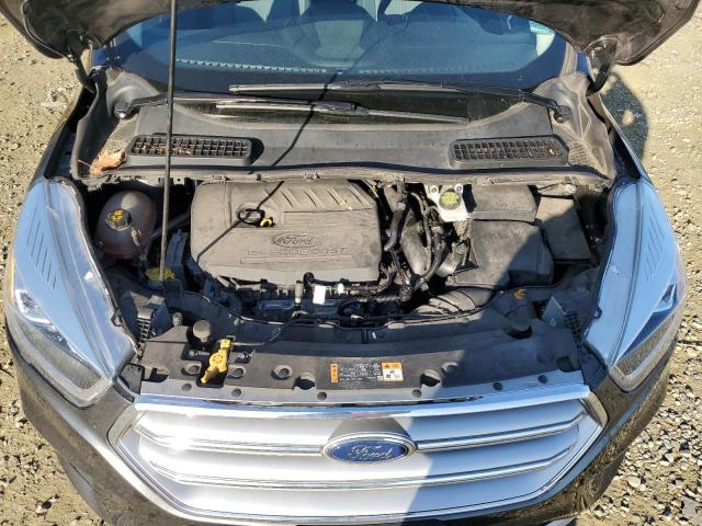 Photo 12 from auction – 2017 FORD ESCAPE SE with VIN 1FMCU9GD0HUE56157