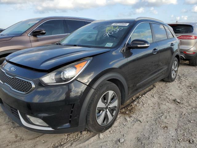 KIA NIRO EX 2017 con VIN KNDCC3LC4H5057036 - Foto de la subasta