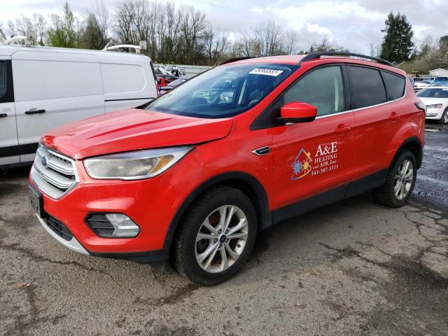 FORD ESCAPE SE 2018 with VIN 1FMCU9GD9JUD29915 - Photo from auction