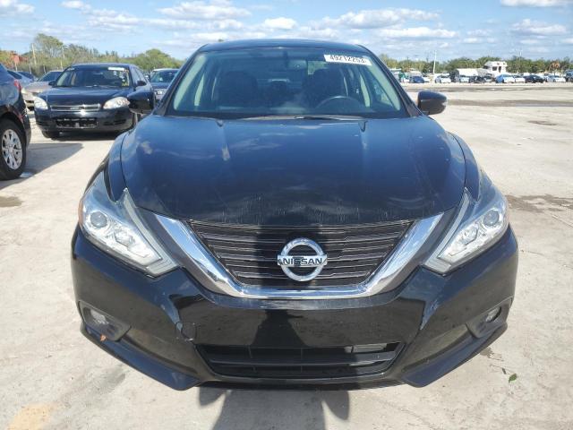 Photo 5 from auction – 2016 NISSAN ALTIMA 2.5 with VIN 1N4AL3AP2GC179228