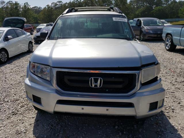 Photo 5 from auction – 2011 HONDA RIDGELINE with VIN 5FPYK1F28BB001551