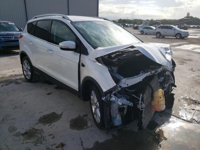 Photo 4 from auction – 2016 FORD ESCAPE TIT with VIN 1FMCU0J92GUB70342