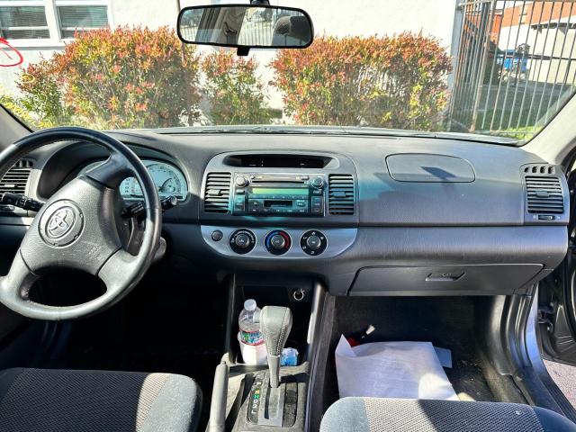 Photo 9 from auction – 2002 TOYOTA CAMRY LE with VIN JTDBE32K320058391