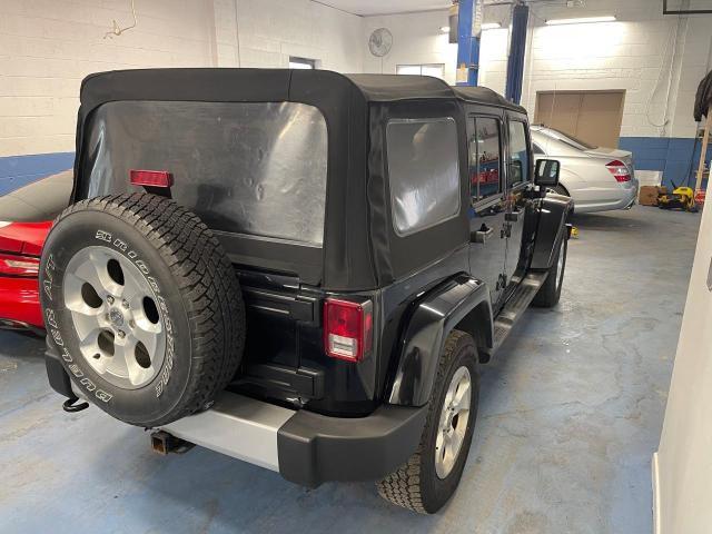 Photo 4 from auction – 2013 JEEP WRANGLER U with VIN 1C4BJWEG9DL684453