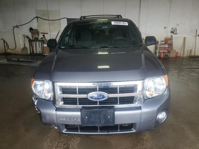 Photo 5 from auction – 2011 FORD ESCAPE with VIN 1FMCU0D77BKB38839