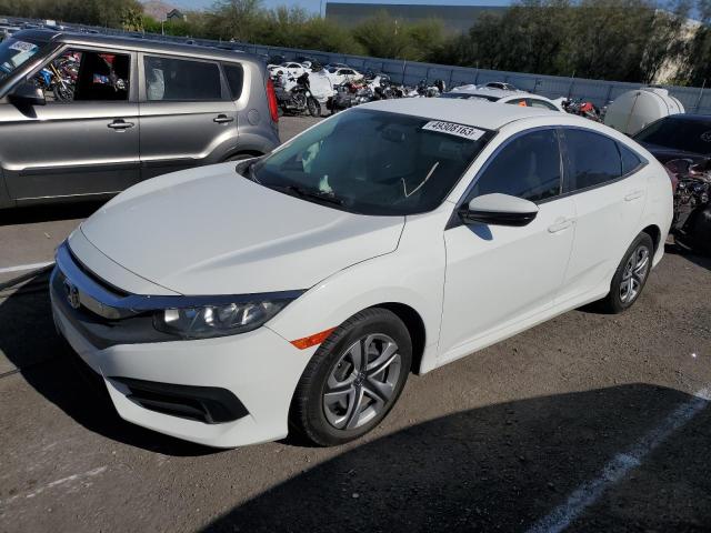 HONDA CIVIC LX 2018 with VIN 19XFC2F52JE009016 - Photo from auction