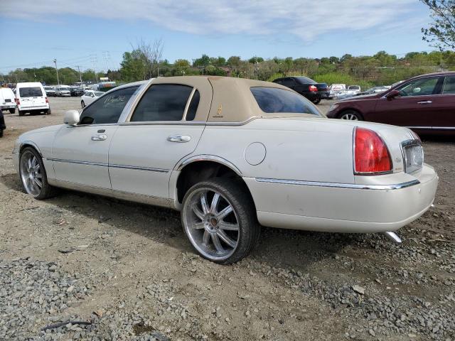 Photo 2 from auction – 2004 LINCOLN TOWN CAR U with VIN 1LNHM83W34Y602108