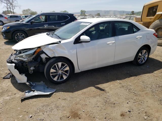 TOYOTA COROLLA EC 2014 with VIN 5YFBPRHE5EP141006 - Photo from auction