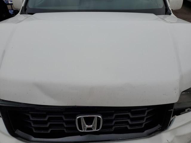 Photo 11 from auction – 2014 HONDA RIDGELINE with VIN 5FPYK1F67EB008238