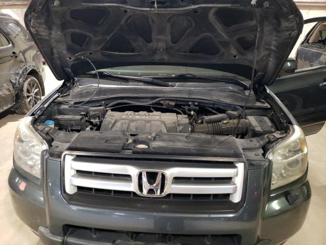 Photo 11 from auction – 2006 HONDA PILOT EX with VIN 2HKYF18436H504617