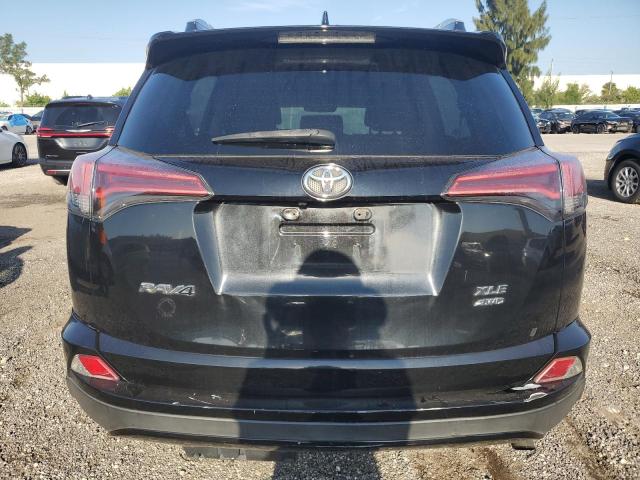 Photo 6 from auction – 2016 TOYOTA RAV4 XLE with VIN 2T3RFREV2GW433713