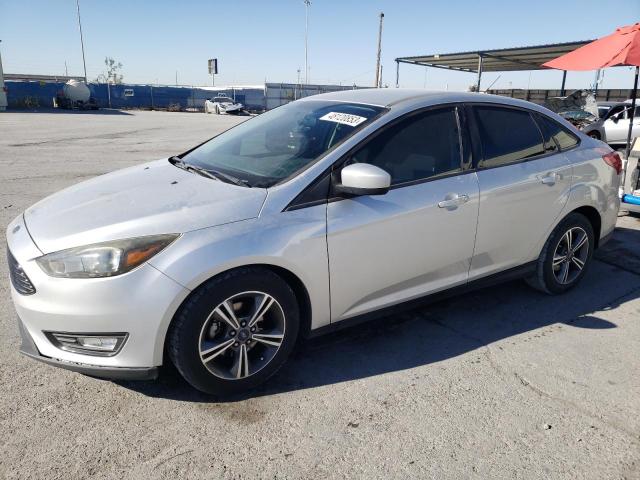 FORD FOCUS SE 2018 مع رقم تعريف المركبة 1FADP3FE5JL204140 - صورة من المزاد