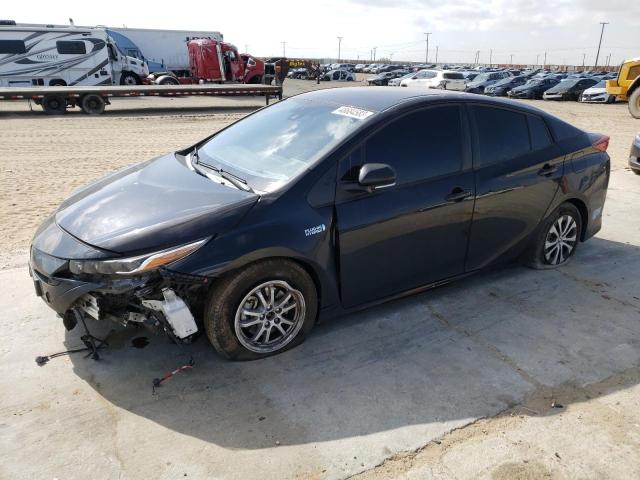 TOYOTA PRIUS PRIM 2021 with VIN JTDKAMFP9M3187809 - Photo from auction