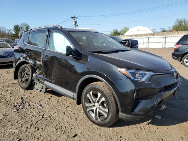 Photo 4 from auction – 2018 TOYOTA RAV4 LE with VIN 2T3BFREV2JW855604