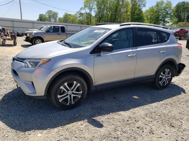 TOYOTA RAV4 LE 2018 with VIN 2T3BFREV2JW698236 - Photo from auction