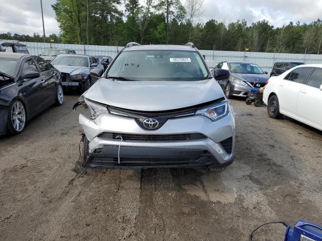 Photo 5 from auction – 2018 TOYOTA RAV4 LE with VIN 2T3ZFREV8JW480171
