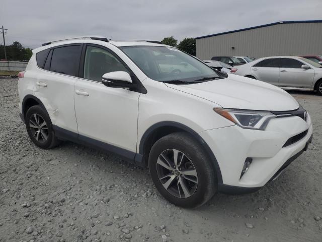 Photo 4 from auction – 2016 TOYOTA RAV4 XLE with VIN JTMWFREV5GJ084158