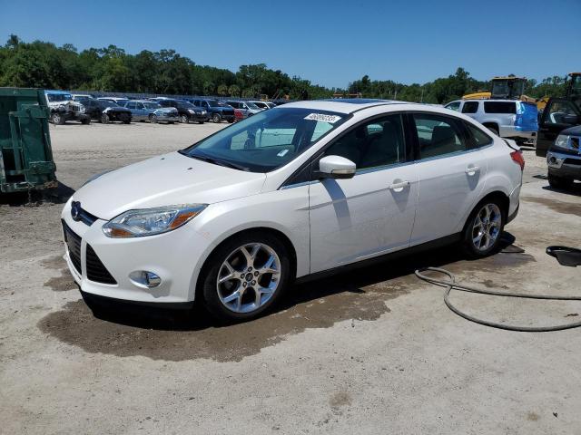 FORD FOCUS SEL 2012 with VIN 1FAHP3H27CL385054 - Photo from auction