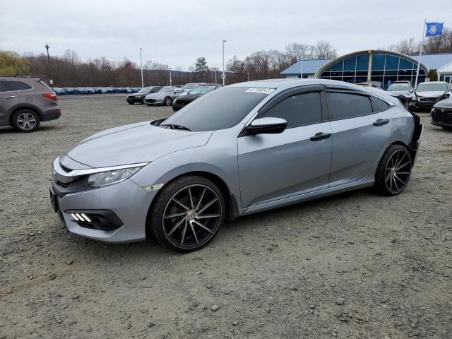HONDA CIVIC EX 2018 with VIN 2HGFC2F75JH549497 - Photo from auction