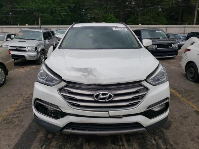 Photo 5 from auction – 2017 HYUNDAI SANTA FE S with VIN 5NMZU3LB6HH011865