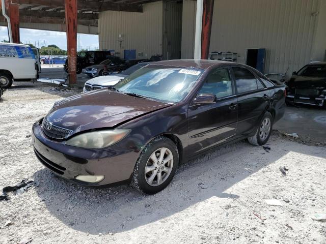 TOYOTA CAMRY LE 2003 with VIN 4T1BE32K03U706422 - Photo from auction