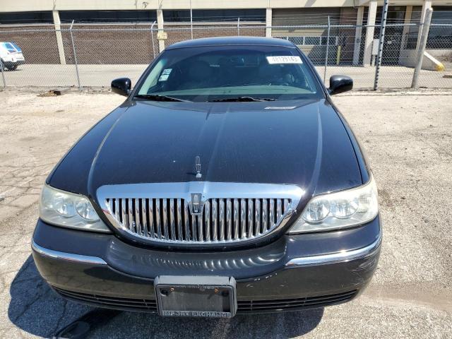 Photo 5 from auction – 2004 LINCOLN TOWN CAR U with VIN 1LNHM83W24Y629316
