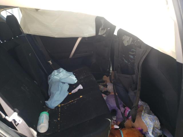 Photo 11 from auction – 2014 TOYOTA RAV4 LE with VIN JTMZFREV4ED034098
