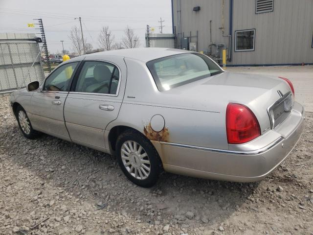 Photo 2 from auction – 2004 LINCOLN TOWN CAR E with VIN 1LNHM81W64Y668963