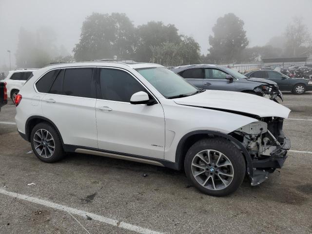 Photo 4 from auction – 2015 BMW X5 XDRIVE3 with VIN 5UXKR0C51F0K71940