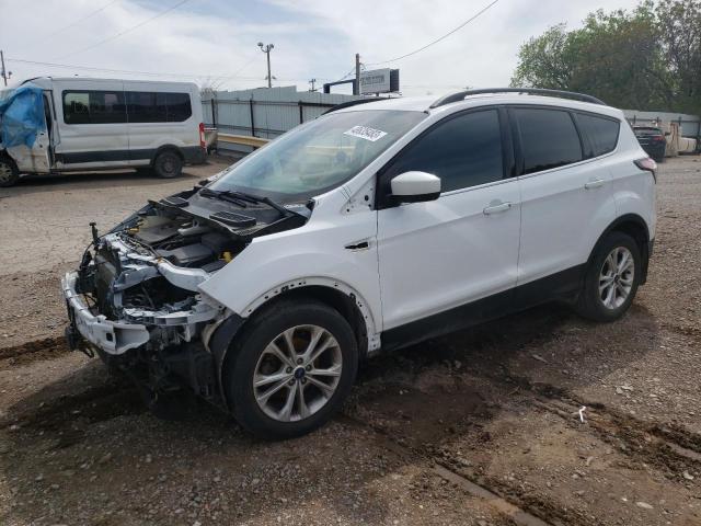 FORD ESCAPE SE 2018 with VIN 1FMCU0GD7JUB85552 - Photo from auction