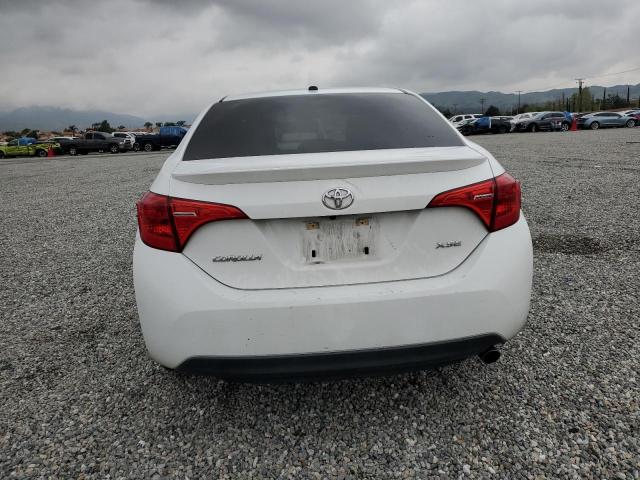 Photo 6 from auction – 2017 TOYOTA COROLLA L with VIN 5YFBURHE9HP698059