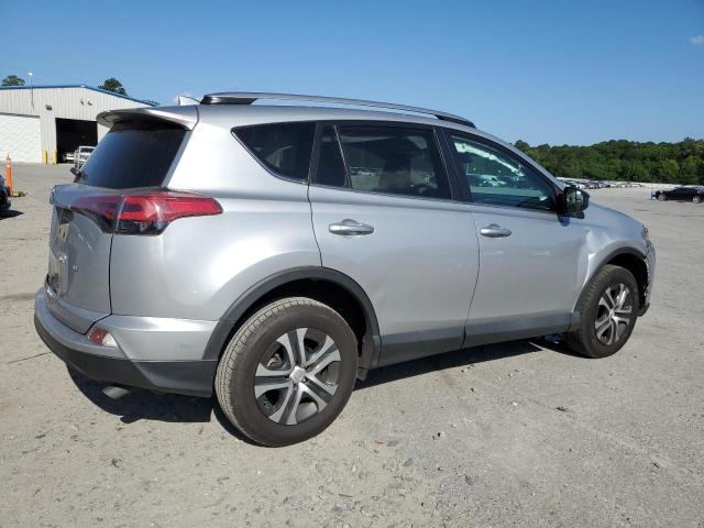 Photo 3 from auction – 2018 TOYOTA RAV4 LE with VIN 2T3ZFREV6JW520912