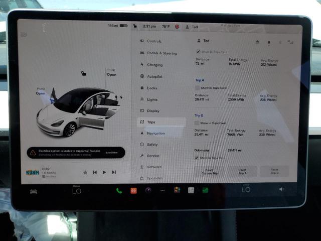 Photo 9 from auction – 2021 TESLA MODEL 3 with VIN 5YJ3E1EB8MF069363