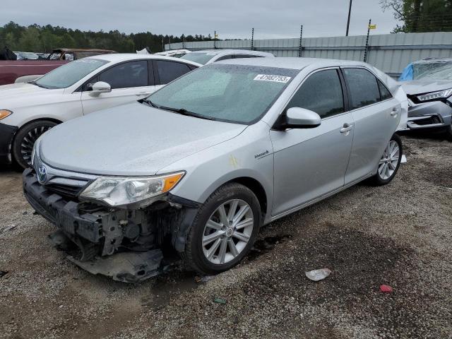 TOYOTA CAMRY HYBR 2012 with VIN 4T1BD1FKXCU039988 - Photo from auction