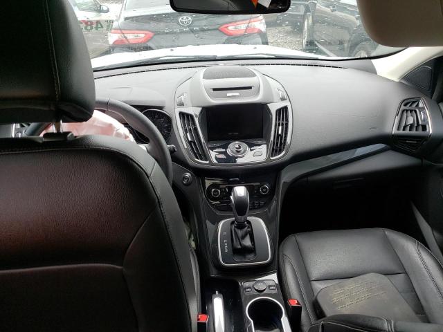 Photo 8 from auction – 2014 FORD ESCAPE TIT with VIN 1FMCU0J96EUB42458