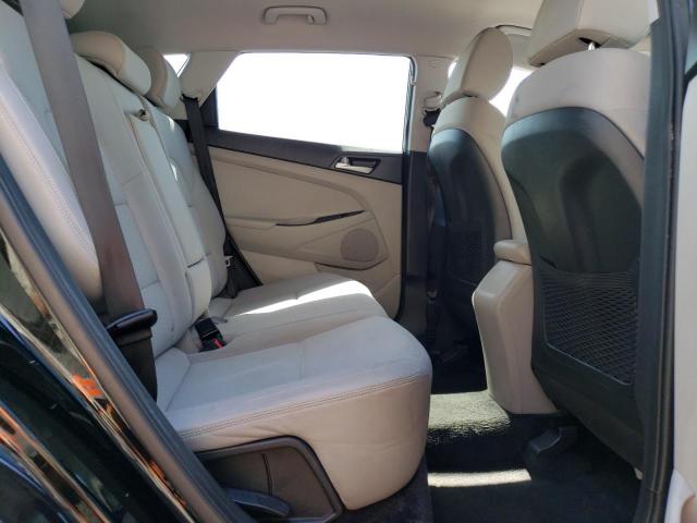 Photo 11 from auction – 2019 HYUNDAI TUCSON SE with VIN KM8J2CA47KU926727