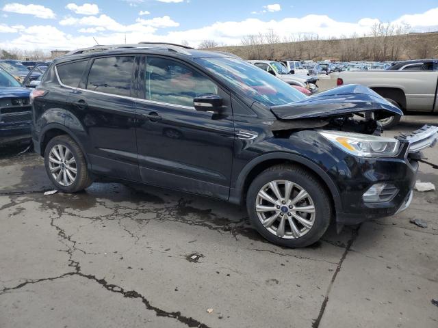 Photo 4 from auction – 2017 FORD ESCAPE TIT with VIN 1FMCU9J92HUB35984