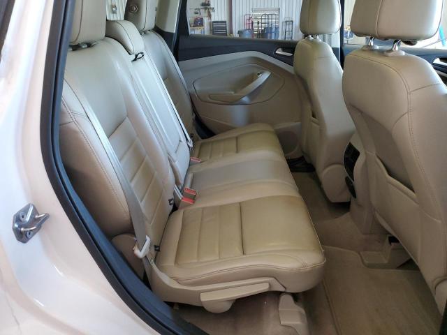 Photo 10 from auction – 2016 FORD ESCAPE SE with VIN 1FMCU9GX7GUB88524