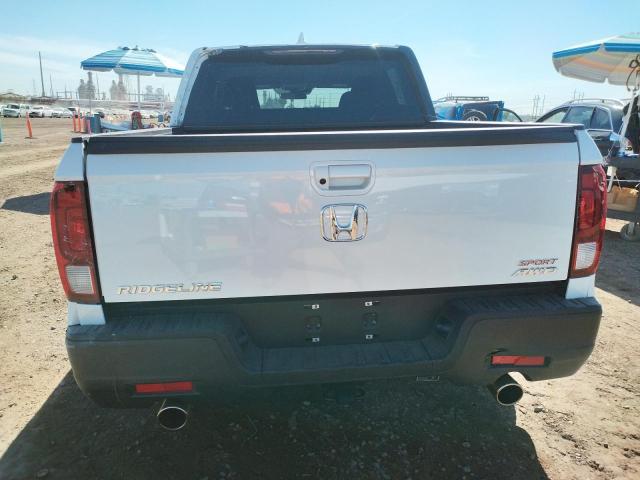 Photo 6 from auction – 2021 HONDA RIDGELINE with VIN 5FPYK3F12MB024183