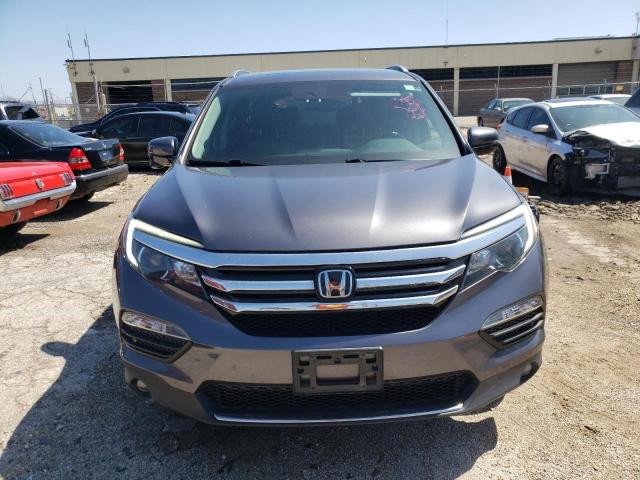 Photo 5 from auction – 2017 HONDA PILOT TOUR with VIN 5FNYF6H9XHB083604