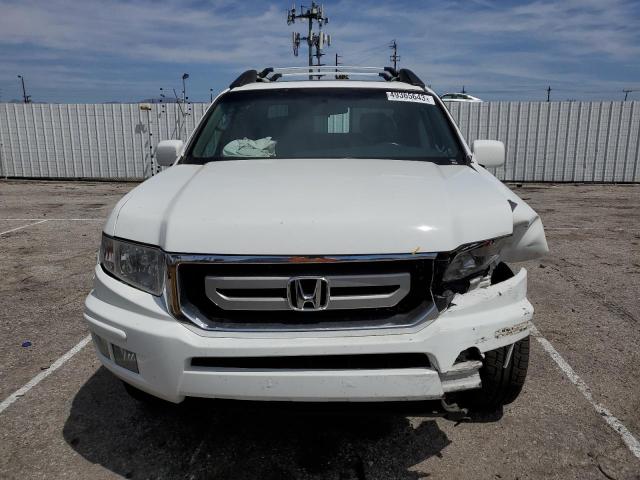Photo 5 from auction – 2011 HONDA RIDGELINE with VIN 5FPYK1F59BB001651