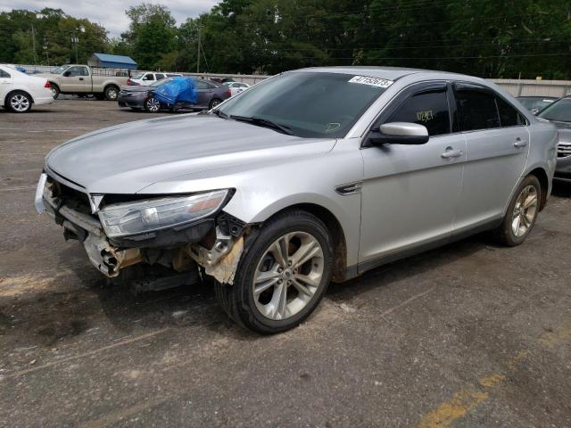 FORD TAURUS SEL 2014 with VIN 1FAHP2E80EG123035 - Photo from auction