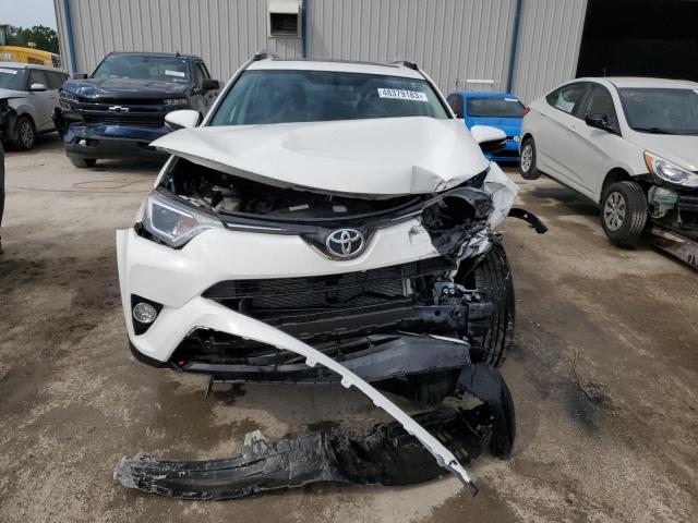 Photo 5 from auction – 2016 TOYOTA RAV4 XLE with VIN JTMWFREV7GJ083478