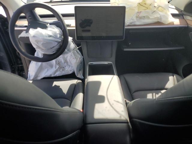 Photo 8 from auction – 2023 TESLA MODEL Y with VIN 7SAYGDEE7PF605805