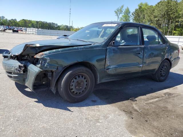 TOYOTA COROLLA VE 2000 with VIN 1NXBR12E1YZ389812 - Photo from auction