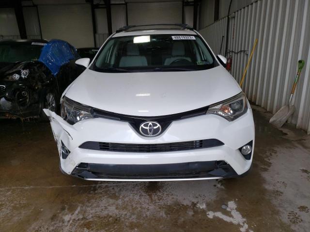 Photo 5 from auction – 2016 TOYOTA RAV4 XLE with VIN JTMRFREV4GJ062603