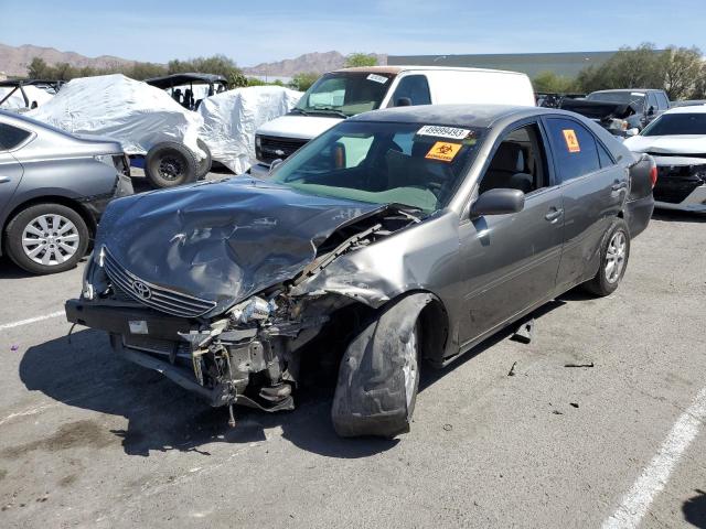 TOYOTA CAMRY LE 2005 with VIN 4T1BF32KX5U605727 - Photo from auction